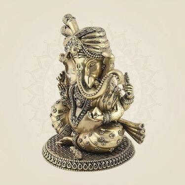 Elegant Brass Ganesha Idol for Home Dcor 
Pooja photo 1